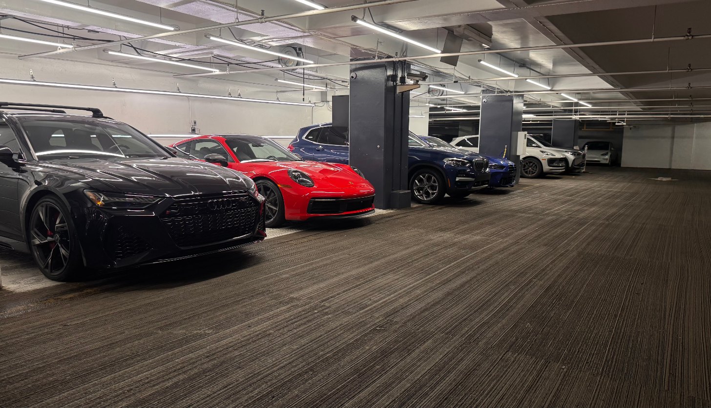Vehicles inside the Eco Car Cafe detailing shop in Bellevue