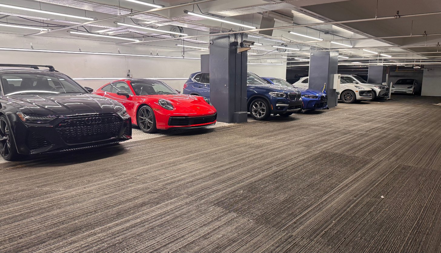 Finished vehicles on the floor of the Eco Car Cafe detailing shop in Bellevue